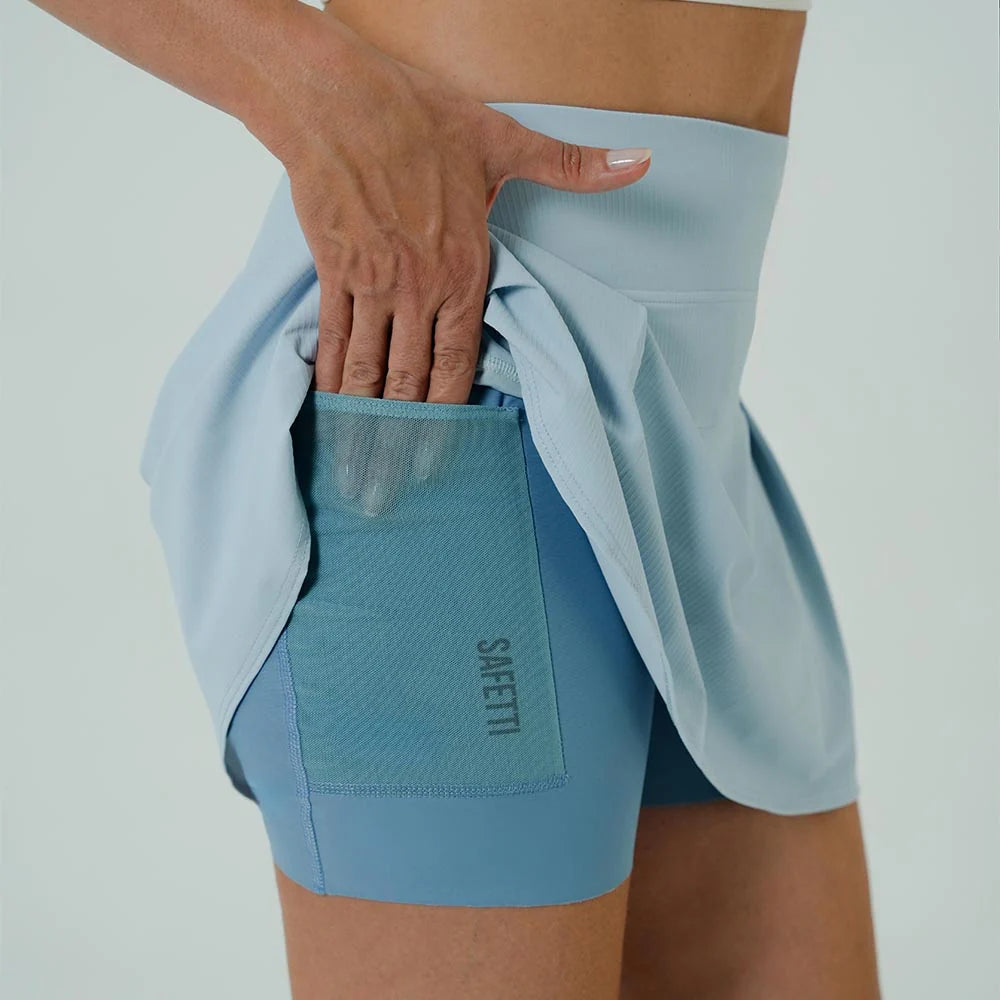 FALDA SHORT RUNNING/PÁDEL FLOW FIT SKY PARA MUJER